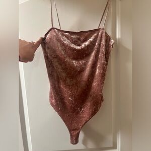 Pink velvet body suit